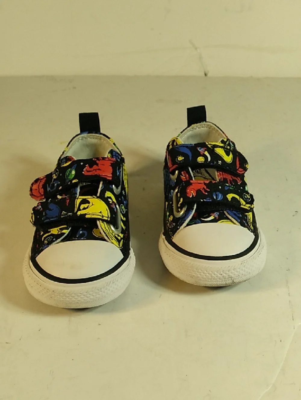 Converse Little Kids Black Canvas Sneakers with Red Yellow Blue Accents, Size 5.